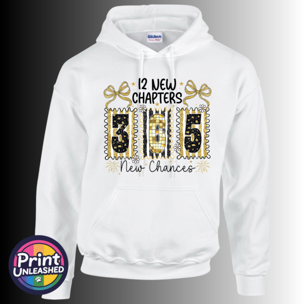 New Chances hoodie 12 new chapters 365 new chances wording with black and gold patterned numbers, bows, flowers and fireworks printed on a white unisex hoodie - Print Unleashed