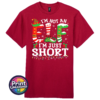 I’m not an elf I’m just short wording with red and green elf-style letters, striped stockings, holly and Christmas lights printed on a cherry red premium unisex T-shirt - Print Unleashed