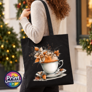 Teacup and saucer with copper and cream autumn leaves, berries and swirling orange steam printed on a tote bag model - Print Unleashed