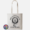 Natural tote bag featuring a dancing skeleton surrounded by bats, stars, a crescent moon, a cat and ghost with Just a Little Ray of Pitch Black lettering - Print Unleashed