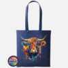 Highland cow portrait with a shaggy orange fringe, sweeping horns and vibrant blue, purple, yellow and green paint splashes printed on a tote bag oxford navy - Print Unleashed