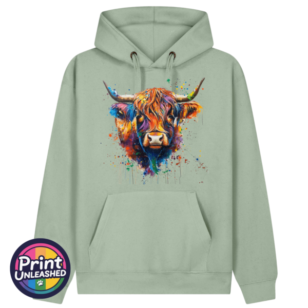 Highland cow portrait with a shaggy orange fringe, sweeping horns and vibrant blue, purple, yellow and green paint splashes printed on a sage premium hoodie - Print Unleashed