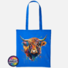 Highland cow portrait with a shaggy orange fringe, sweeping horns and vibrant blue, purple, yellow and green paint splashes printed on a tote bag sapphire - Print Unleashed