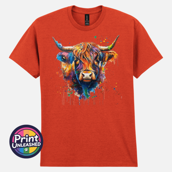 Rainbow highland cow ant ora Highland cow portrait with a shaggy orange fringe, sweeping horns and vibrant blue, purple, yellow and green paint splashes printed on a unisex T-shirt antique orange - Print Unleashed
