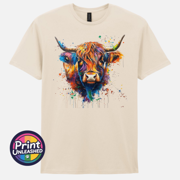 Rainbow highland cow natural Highland cow portrait with a shaggy orange fringe, sweeping horns and vibrant blue, purple, yellow and green paint splashes printed on a unisex T-shirt natural - Print Unleashed