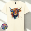 Highland cow portrait with a shaggy orange fringe, sweeping horns and vibrant blue, purple, yellow and green paint splashes printed on a unisex T-shirt off white - Print Unleashed