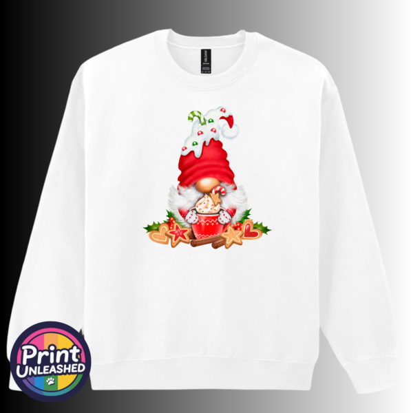 Christmas gonk in a red candy-cane-decorated hat holding a cream-topped cocoa mug, surrounded by iced biscuits, cinnamon and holly, printed on a white unisex sweatshirt - Print Unleashed