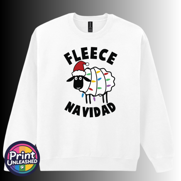 Sheep Fleece Navidad sweat Cartoon sheep wearing a Santa hat and wrapped in colourful Christmas lights between Fleece Navidad wording, printed on a white unisex sweatshirt - Print Unleashed