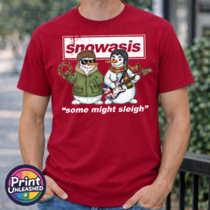 Two musical snowmen with a tambourine and Union Jack guitar beneath Snowasis lettering and Some Might Sleigh wording, printed on a premium unisex T-shirt in cherry red male model - Print Unleashed