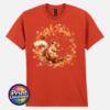 Red squirrel with a sweeping bushy tail surrounded by a swirl of orange, red and golden autumn leaves printed on a unisex T-shirt antique orange - Print Unleashed