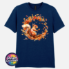 Red squirrel with a sweeping bushy tail surrounded by a swirl of orange, red and golden autumn leaves printed on a unisex T-shirt navy - Print Unleashed