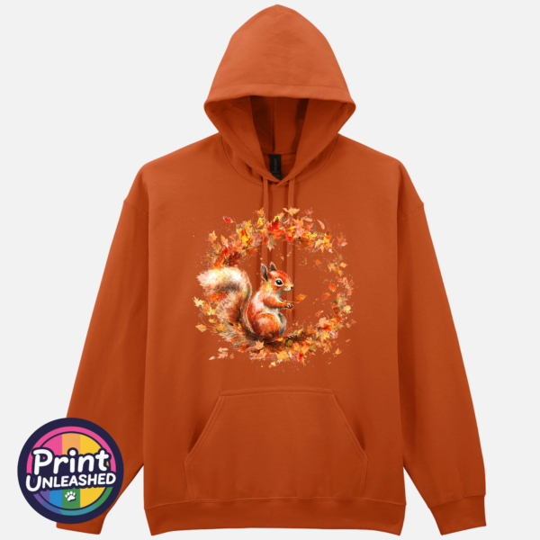 Squirrel tex ora Red squirrel with a sweeping bushy tail surrounded by a swirl of orange, red and golden autumn leaves printed on a softstyle hoodie texas orange - Print Unleashed