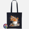Teacup and saucer with copper and cream autumn leaves, berries and swirling orange steam printed on a tote bag black - Print Unleashed