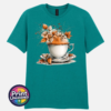 Teacup and saucer with copper and cream autumn leaves, berries and swirling orange steam printed on a jade unisex T-shirt - Print Unleashed