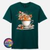 Teacup and saucer with copper and cream autumn leaves, berries and swirling orange steam printed on a marine green unisex T-shirt - Print Unleashed