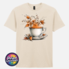 Teacup and saucer with copper and cream autumn leaves, berries and swirling orange steam printed on a natural unisex T-shirt - Print Unleashed