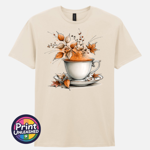 Tea natural Teacup and saucer with copper and cream autumn leaves, berries and swirling orange steam printed on a natural unisex T-shirt - Print Unleashed