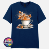 Teacup and saucer with copper and cream autumn leaves, berries and swirling orange steam printed on a navy unisex T-shirt - Print Unleashed
