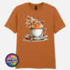 Teacup and saucer with copper and cream autumn leaves, berries and swirling orange steam printed on a texas orange unisex T-shirt - Print Unleashed