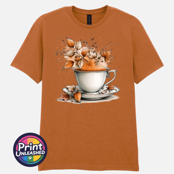 Tea tex oarnge Teacup and saucer with copper and cream autumn leaves, berries and swirling orange steam printed on a texas orange unisex T-shirt - Print Unleashed
