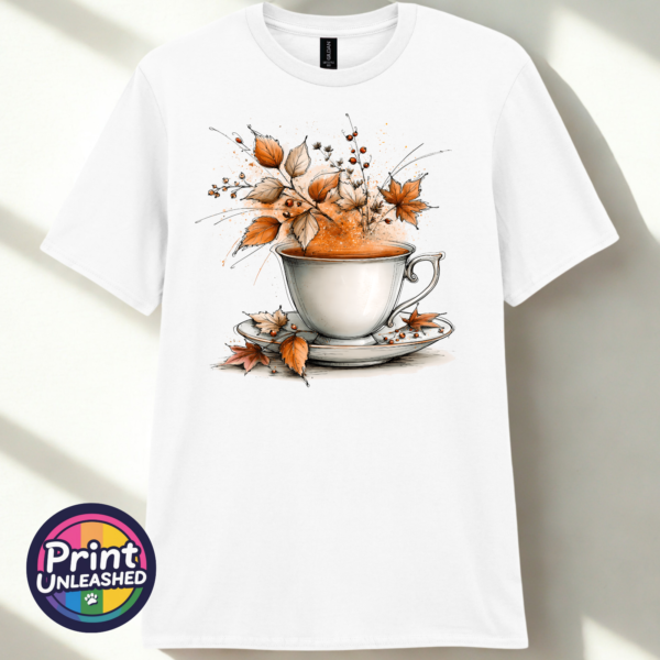 Tea white Teacup and saucer with copper and cream autumn leaves, berries and swirling orange steam printed on a white unisex T-shirt - Print Unleashed