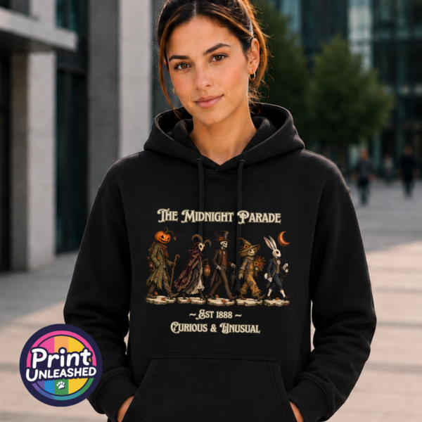 The Midnight Parade featuring a pumpkin-headed wanderer, horned masked figure, skeleton, scarecrow and rabbit with a crescent-moon balloon, printed on an Everyday Hoodie female model - Print Unleashed