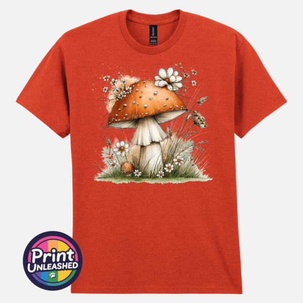 Toadstool ant ora Copper-orange toadstool with white flowers and grasses on an off-white unisex T-shirt antique orange - Print Unleashed