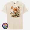 Copper, peach and cream wildflowers with delicate grasses and an orange butterfly printed on a unisex T-shirt natural - Print Unleashed