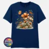 Copper, peach and cream wildflowers with delicate grasses and an orange butterfly printed on a navy unisex T-shirt - Print Unleashed