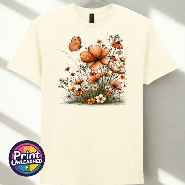 Wildflowers off white Copper, peach and cream wildflowers with delicate grasses and an orange butterfly printed on a unisex T-shirt off white - Print Unleashed