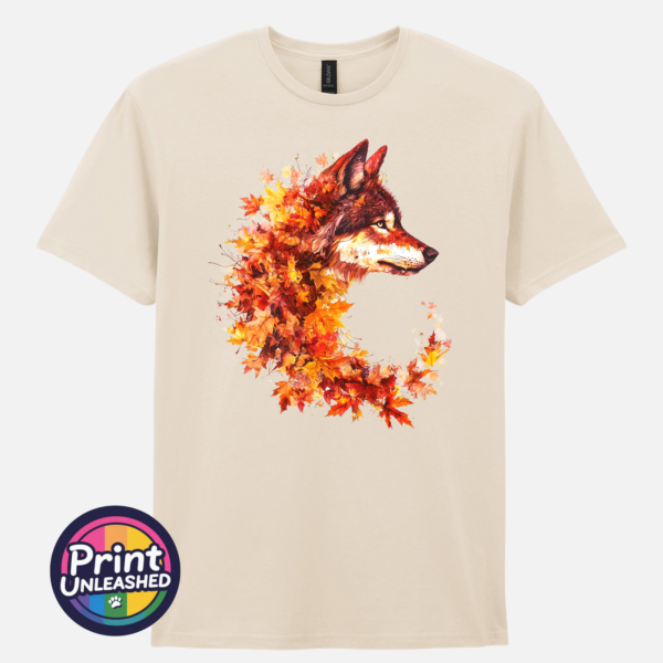 Wold natural Wolf in profile with a golden eye and fur blending into red, orange and golden autumn leaves on a unisex T-shirt natural - Print Unleashed