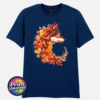 Wolf in profile with a golden eye and fur blending into red, orange and golden autumn leaves on a unisex T-shirt navy - Print Unleashed