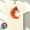 Wolf in profile with a golden eye and fur blending into red, orange and golden autumn leaves on a unisex T-shirt off white - Print Unleashed