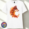 Wolf in profile with a golden eye and fur blending into red, orange and golden autumn leaves on a unisex T-shirt white - Print Unleashed