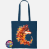 Wolf in profile with a golden eye and fur blending into red, orange and golden autumn leaves on a tote bag petrol - Print Unleashed