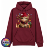 Model wearing a Classic Hoodie featuring a fluffy Highland calf in a red Christmas hat and checked scarf, surrounded by presents and festive decorations, pepper red colour - Print Unleashed
