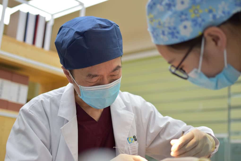 dentists working on patient