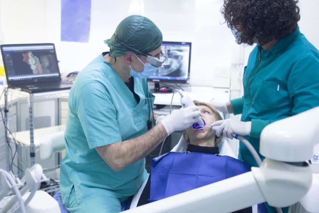 dentists working on a patient
