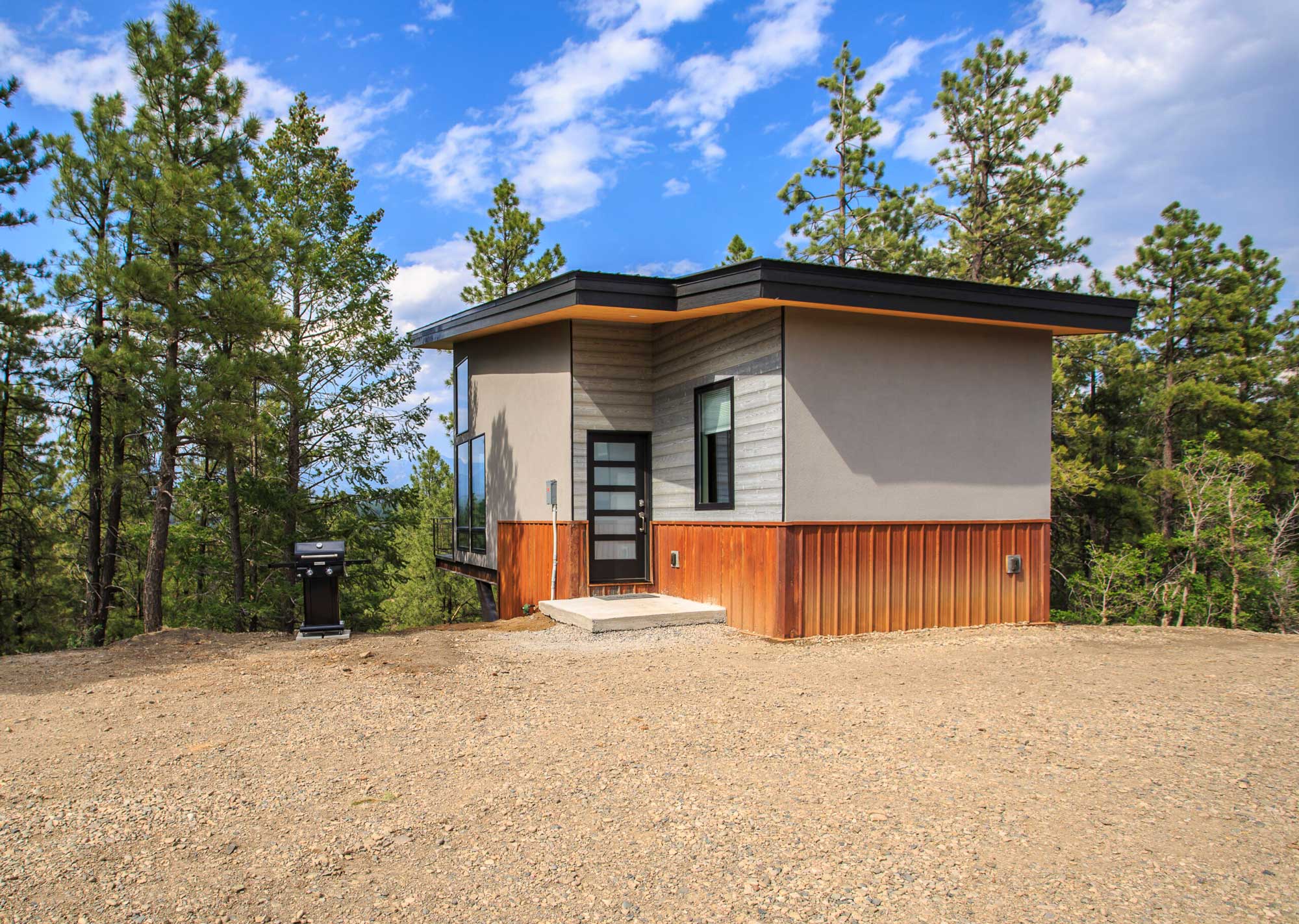 Modern Cedar Creek cabin with sleek design and natural surroundings.