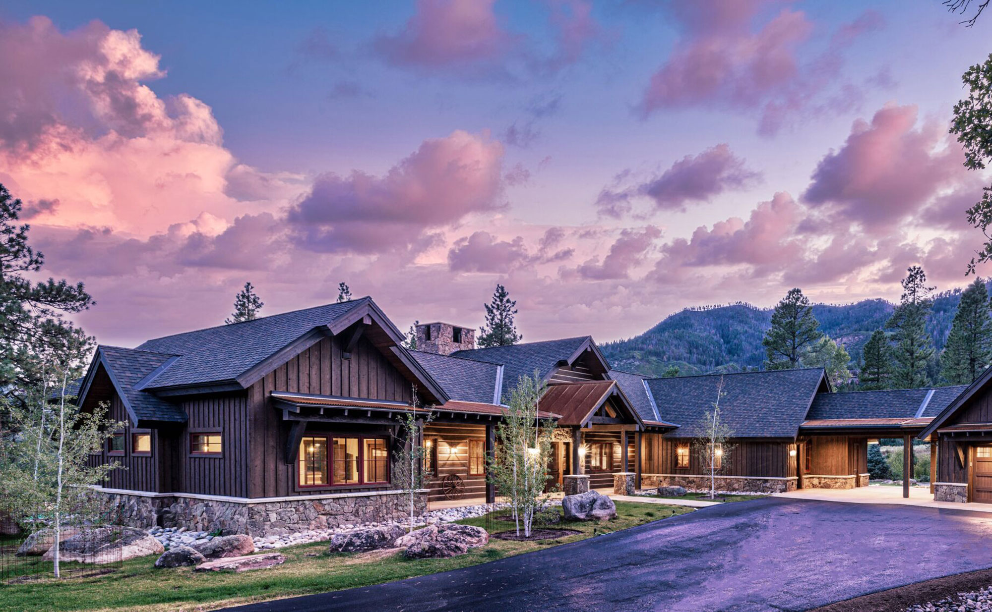 Reynolds Ash + Associates Architecture & Engineering, mountain lodge at sunset.