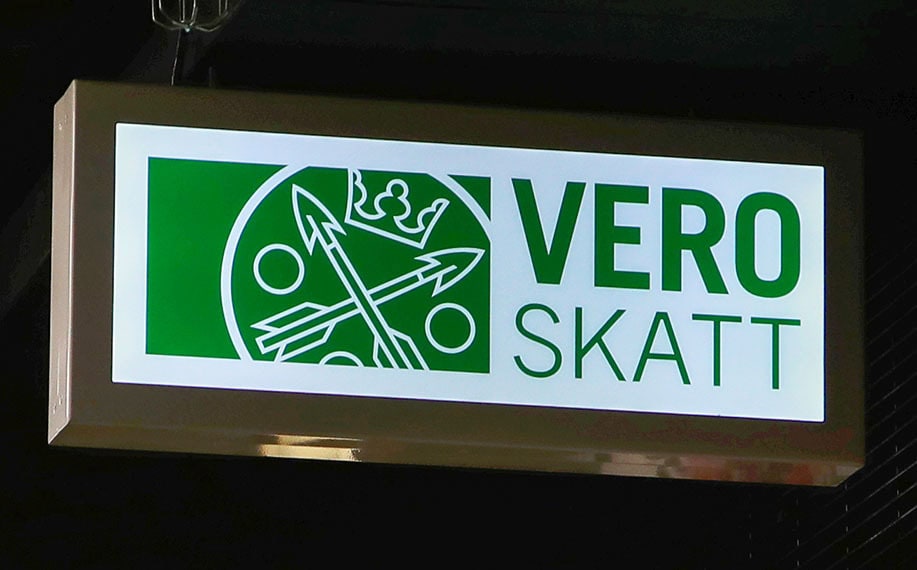 Kuvituskuva jossa verotoimiston valokyltti.