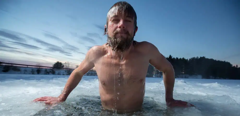 Ice bath A man jumping into an ice bath with a look of shock on his face