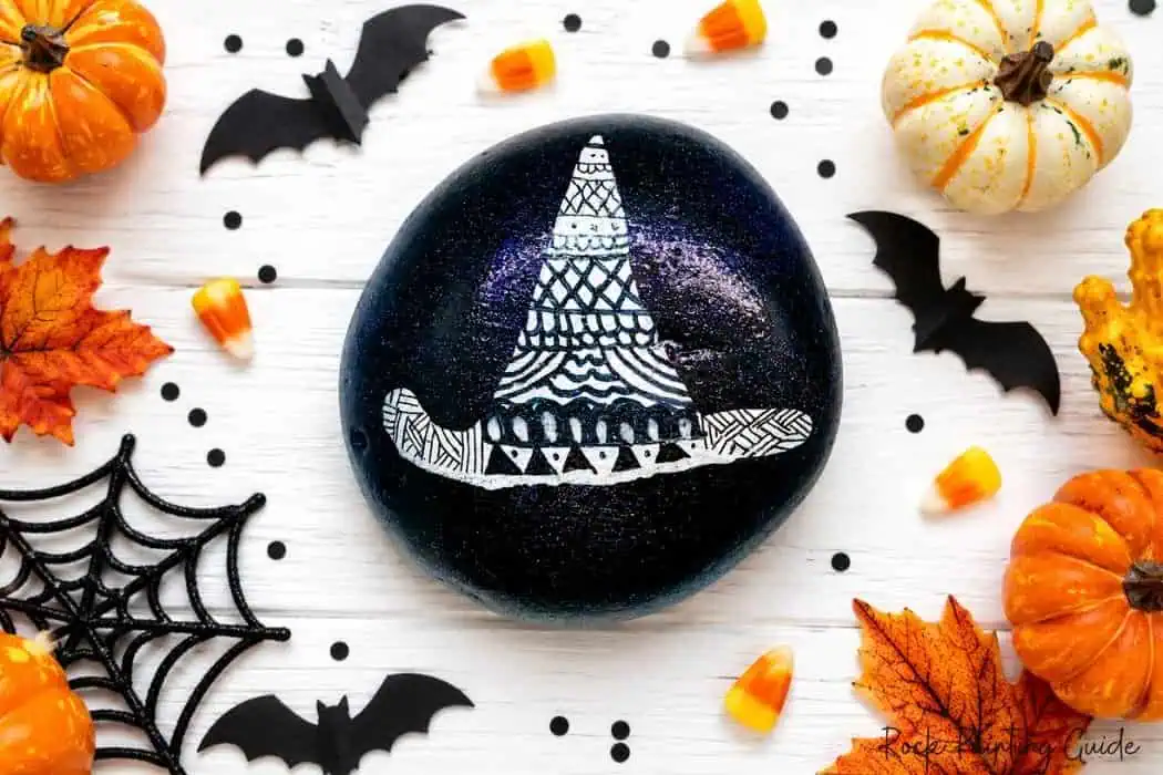 8 Easy Halloween Rock Painting Ideas for Kids 9 zentangle witch hat painted rock