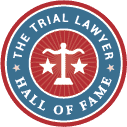 Trial Lawyer Hall of Fame logo with scales of justice and text.