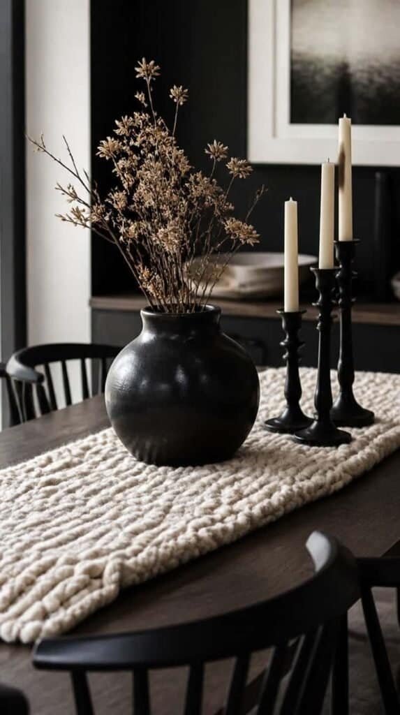 Chunky cream knit table runner under a black ceramic centerpiece