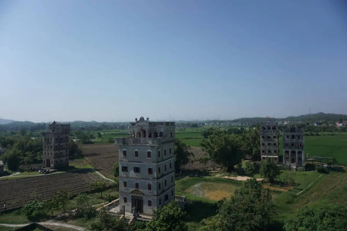 Kaiping diaolou in Zili Village, fortified watchtowers built with overseas remittance money, combining Chinese and European architectural styles