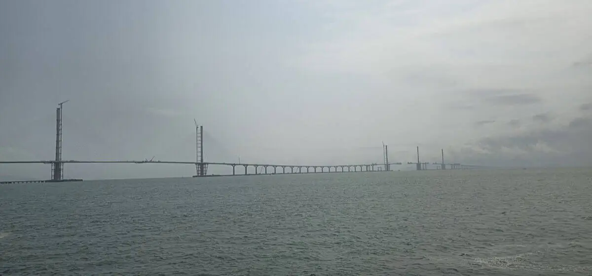 The Huangmaohai Cross-Sea Corridor at dusk, the 31-kilometre bridge opened in 2024 that cut the Zhuhai-to-Taishan drive to about 30 minutes.