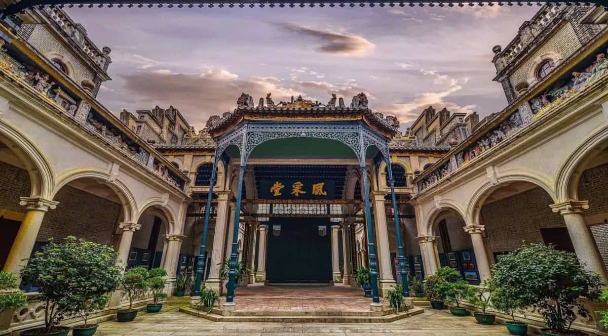 The Fengcai Hall, the grand clan hall of the Yu surname on the Tanjiang at Dihai in Kaiping, with arched courtyard wings and ornate tiled roofs