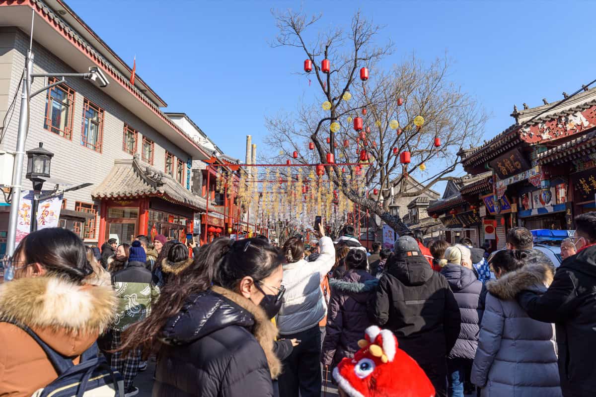 Red lanterns of the Changdian temple fair over Liulichang West Street, Beijing, on the opening days of the lunar year.