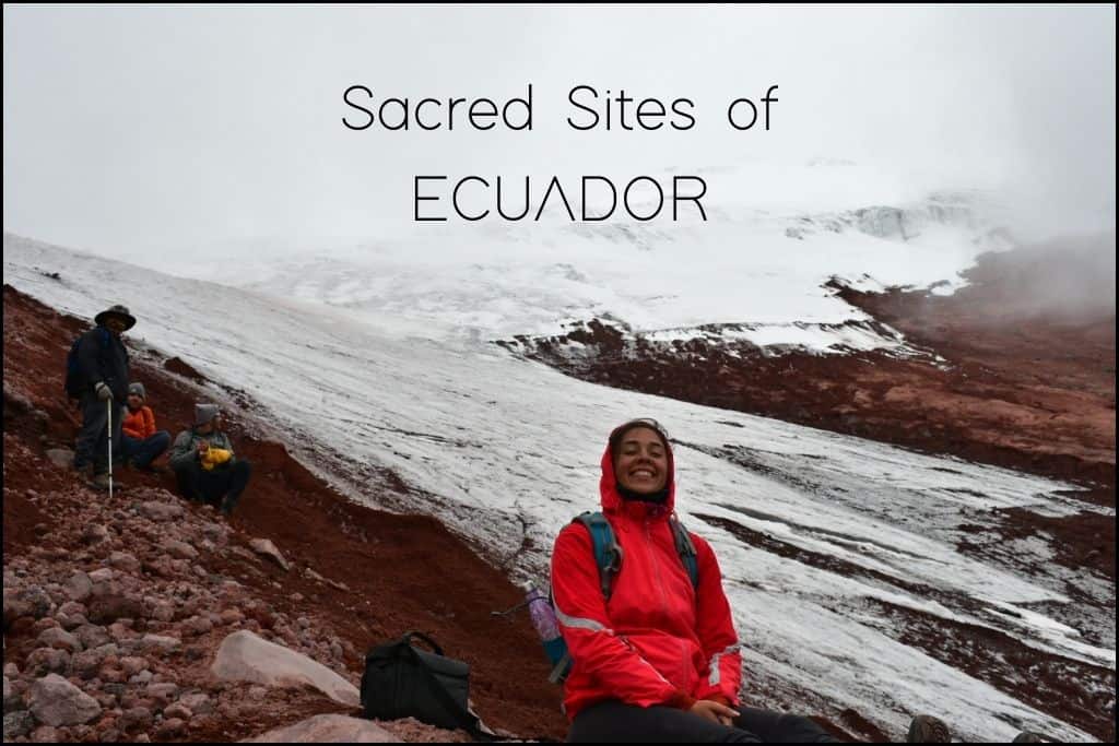 Find Your Spiritual Places in South America Cheerful Giorgy's traveler sits on the reddish-brown terrain of an Ecuadorian mountain, with snow-capped peaks shrouded in mist in the distance, and local guides resting nearby. 'Sacred Sites of ECUADOR' on the image implies an exploration of Ecuador's majestic and spiritual highland regions.